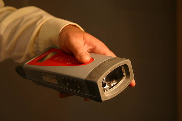 Using a hand scanner stock photo