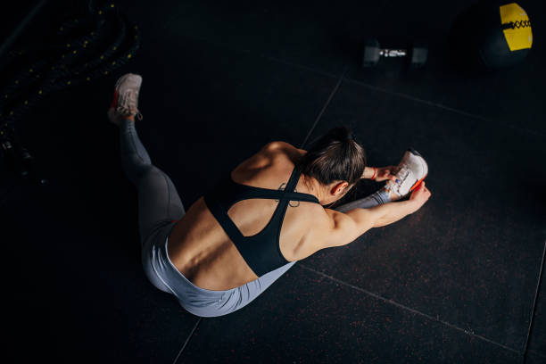 istock Fit woman exercising in gym 1390889463