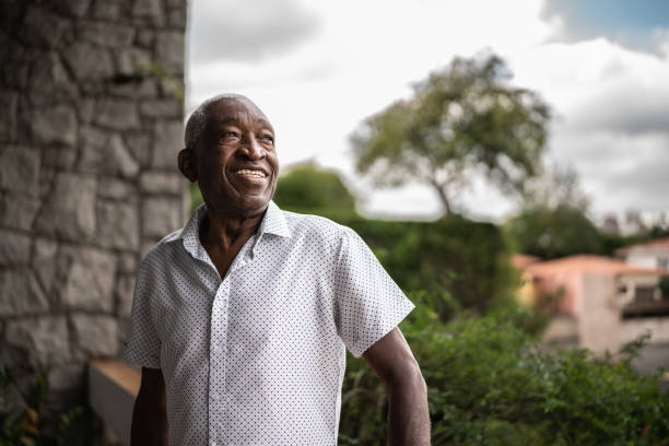 istock Senior man looking away contemplating 1390893110