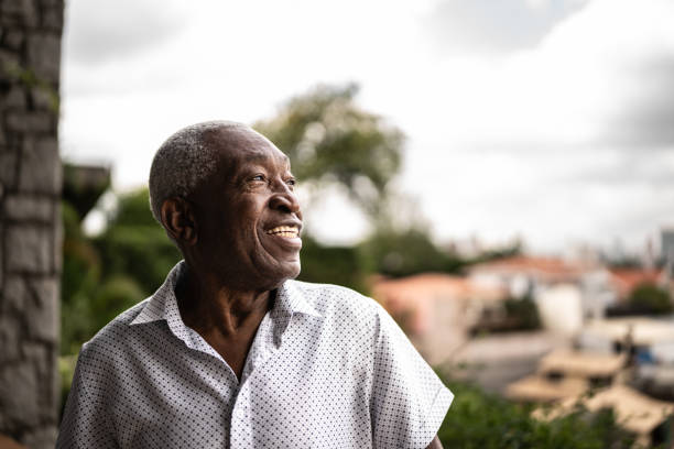 istock Senior man looking away contemplating 1390893123
