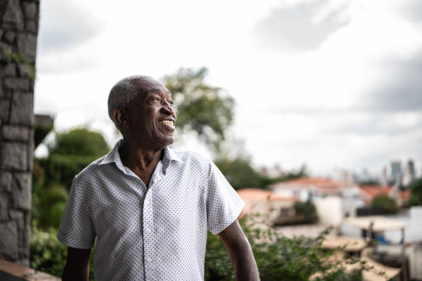 istock Senior man looking away contemplating 1390893128