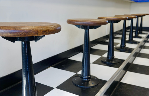 Retro modern counter stools in local diner