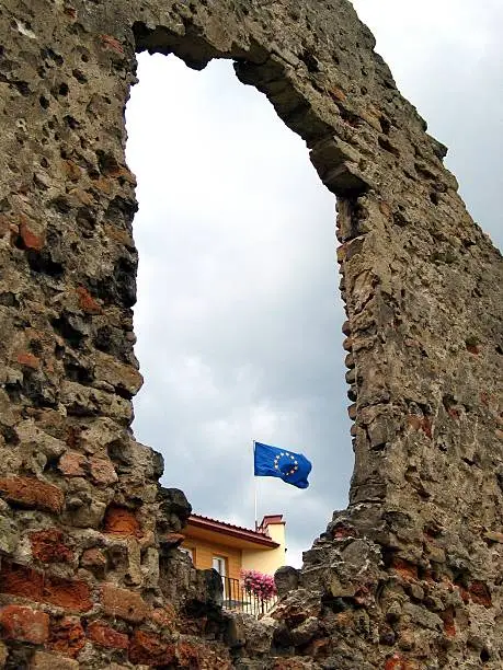 European Union flag and ruins