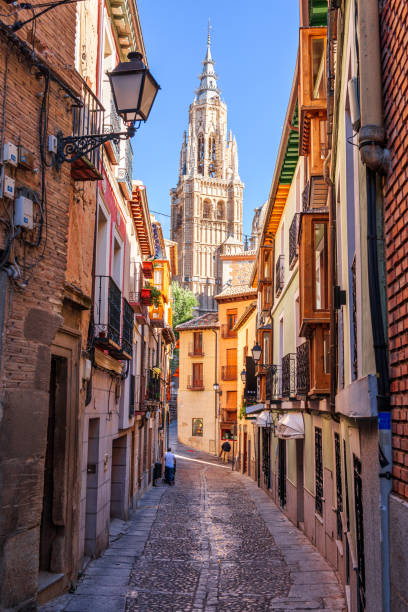 istock Toledo, Spain alleyway towards Toledo Cathedral 1390897150
