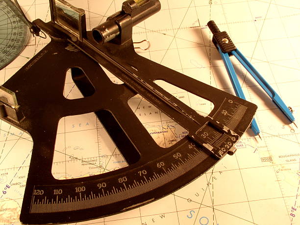 istock Dividers, protractor, and sextant on top of chart South Seas 139089791