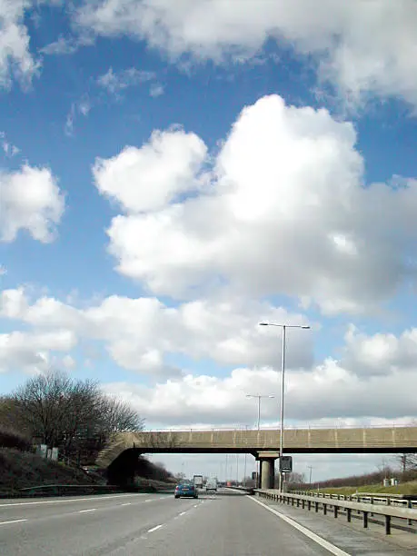 Motorway shot in England, with perfect clouds ! Flip it for right hand drive regions !  If you download, please comment if you can. I'm trying to build a portfolio of work.