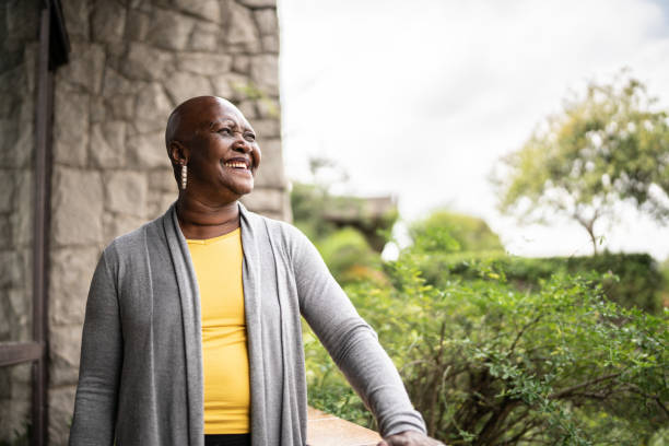 istock Contemplative senior woman looking at view 1390898655