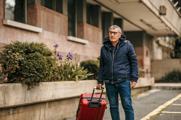 istock Traveling with Luggage 1390898734