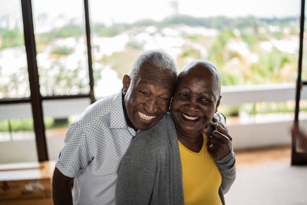 istock Happy senior couple together at home 1390899593