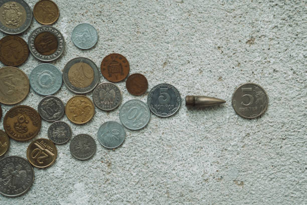 istock A bullet and Russian ruble and Ukraine and other countries. 1390902120