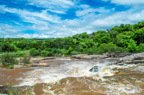 istock Beautiful landscape with waterfall, blue sky, trees, rivers, mountains and clouds. 1390903006