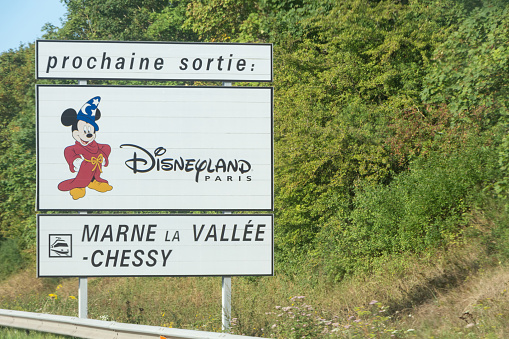 Lognes – France, August 19, 2019 : Disneyland roadsign on the highway