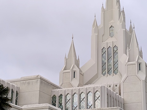 A closeup of the San Diego Temple's roof, showing off its spires and beautiful stained glass.