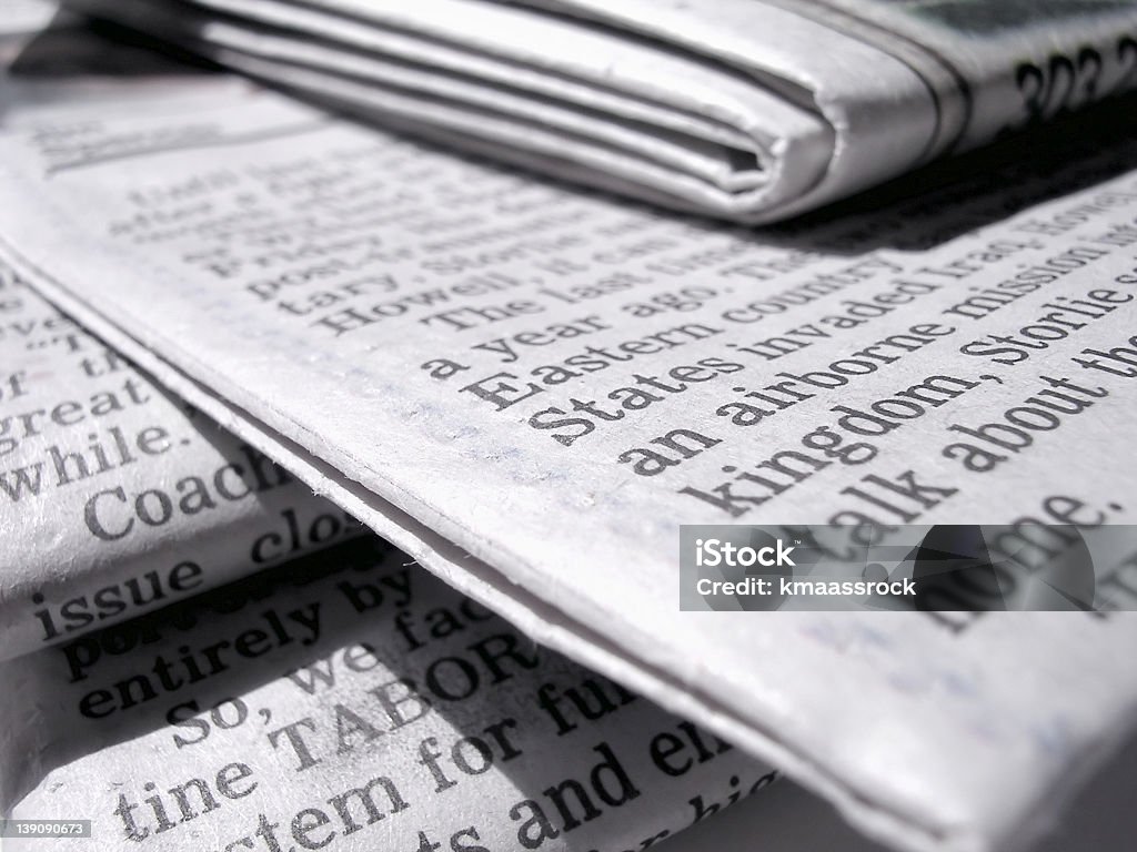 Arvada papers stacked randomly Newpapers, isolated. Newspaper Stock Photo