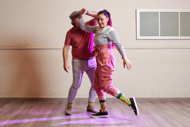 istock Lindy Hop teachers giving classes in a dance studio 1390910423