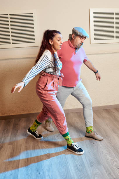 istock Lindy Hop teachers giving classes in a dance studio 1390910491