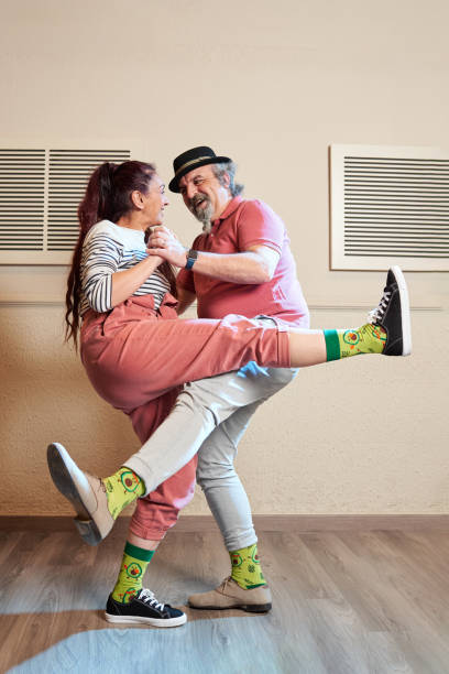 istock A man and a woman dancing Lindy Hop in a dance studio 1390910547