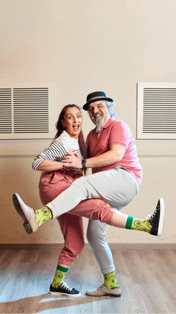 istock A man and a woman dancing Lindy Hop in a dance studio 1390910550