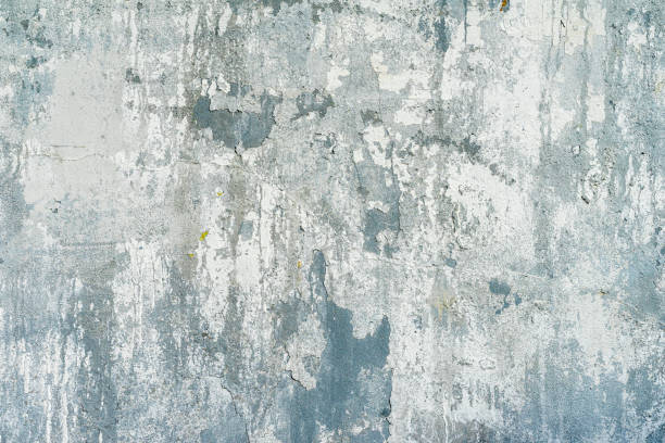 istock Old shabby concrete wall, natural rough texture. Vintage background 1390913276