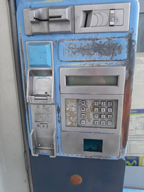 old abandoned blue coin operated pay phone - coin operated pay phone telephone communication imagens e fotografias de stock