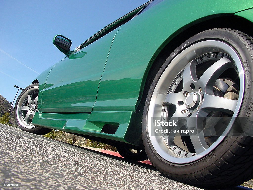 Green integra with wheels and kit (28) green integra with full body kit. shot from the ground. Lowering Stock Photo