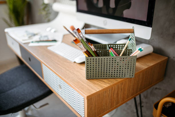 istock Painting supplies on desk 1390922486