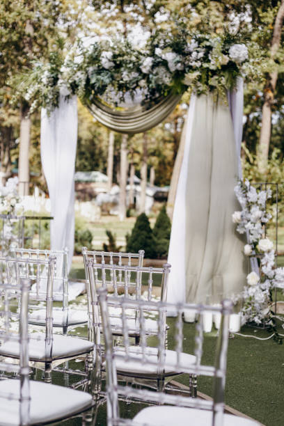 istock Wedding ceremony decor, elegant arch outdoors 1390922820