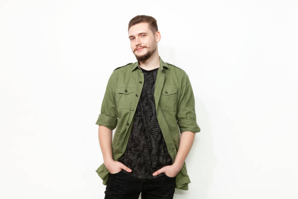 istock Studio portrait of a 22 year old bearded man 1390926909