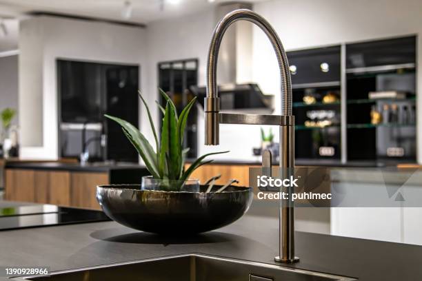 New Modern Steel Faucet And Kitchen Room Sink Close Up Stock Photo - Download Image Now