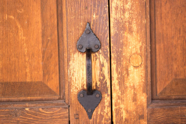 istock Santa Fe Style: Weathered Rustic Wood Door Close-Up 1390933844