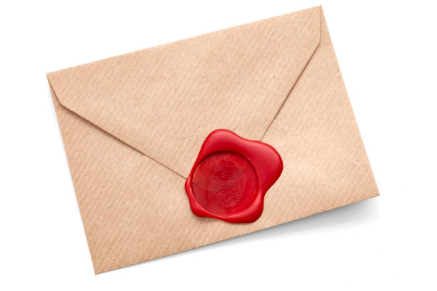istock Old letter, confidential correspondence and private mail concept with closed envelope with red wax seal isolated on white background with clipping path cutout 1390944369