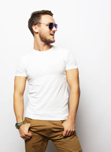 istock Elegant young handsome man. Studio fashion portrait 1390946253