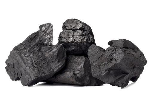 Natural wood charcoal, traditional charcoal or non smoke and odorless charcoal hard wood charcoal isolated on white background.