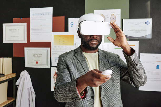 istock Man in VR goggles at virtual meeting 1390960938