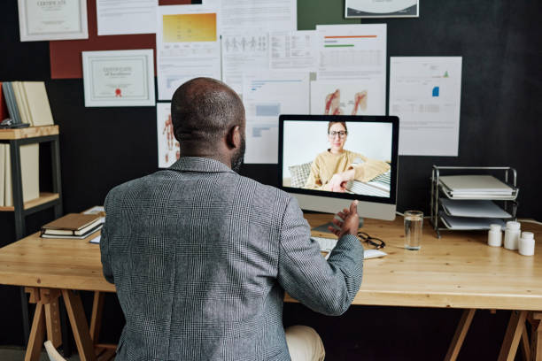 istock Doctor talking to patient online 1390960958