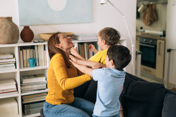istock mother and kids at home 1390970130