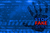 Stop Fake News on a binary code background
