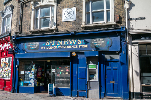 S&J News Convenience Store on Rochester High Street in Kent, England. This is a commercial business.