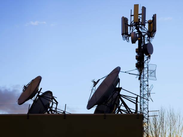 istock satellite dishes and relay installations on a pole 1390973715