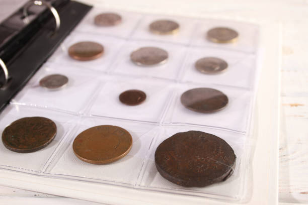 istock Many coins of different countries and times. Numismatics 1390975263