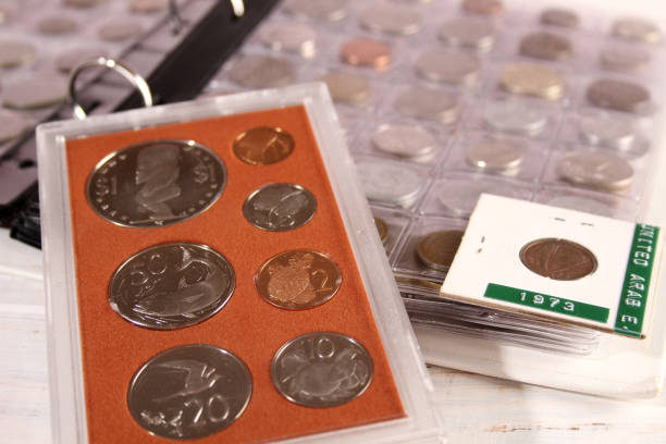 istock Many coins of different countries and times. Numismatics 1390975292