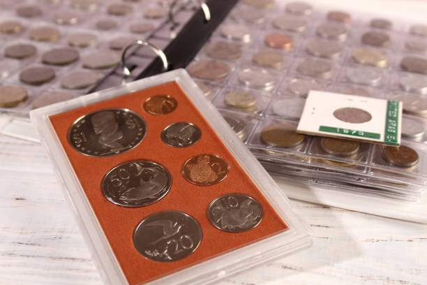 istock Many coins of different countries and times. Numismatics 1390975449