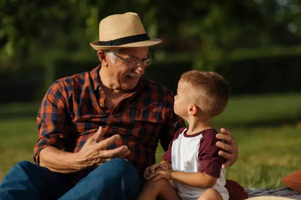 Grandpa and grandson having bonding time together