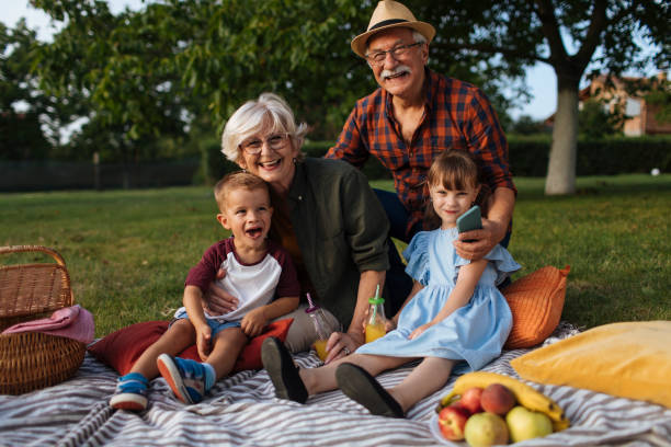 istock Happy grandparents with kids 1390976423