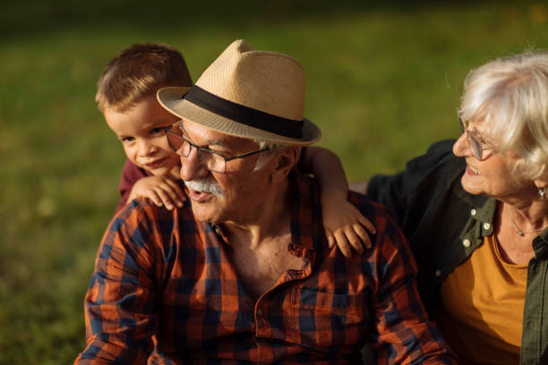 istock Piggyback ride on grandpa 1390976432