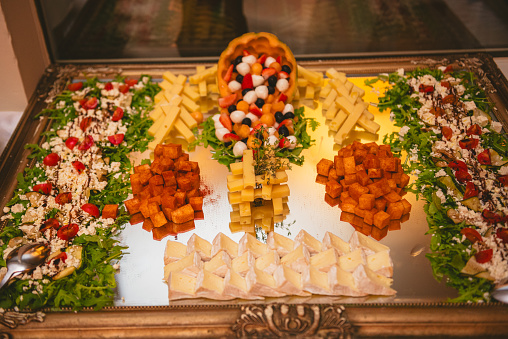 Variety of cheese on a plate, nicely decorated