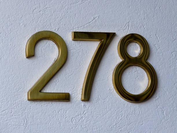 istock Metal home number on a wall 1390977849