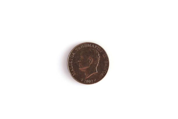 istock Numismatics. Old coin on a white background 1390978907