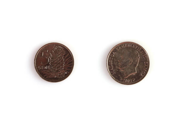 istock Numismatics. Old coin on a white background 1390978919
