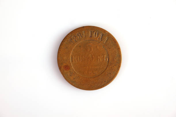 istock Numismatics. Old coin on a white background 1390978979